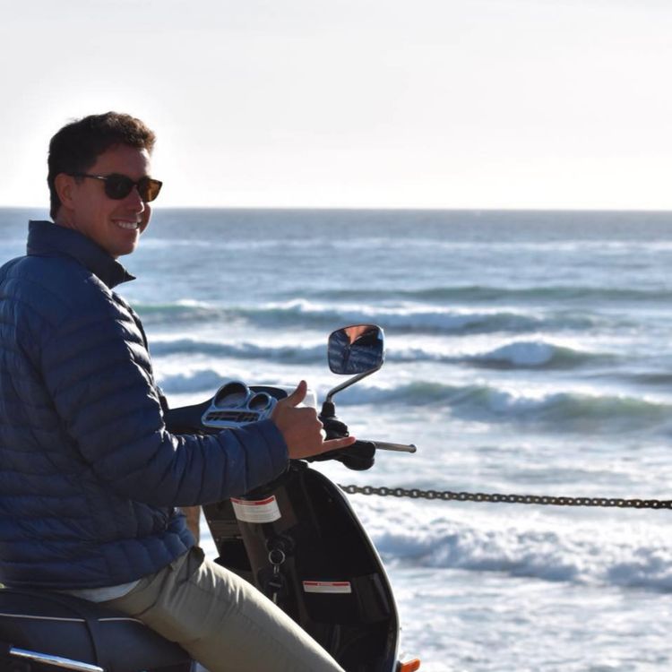 cover art for Manifesting Your Dreams and Surfing Around the World with Eddy Goldaracena