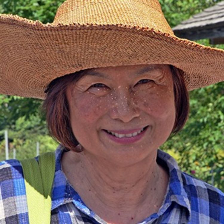 cover art for Fan Pen Chen, a professor in Guilderland's community gardens