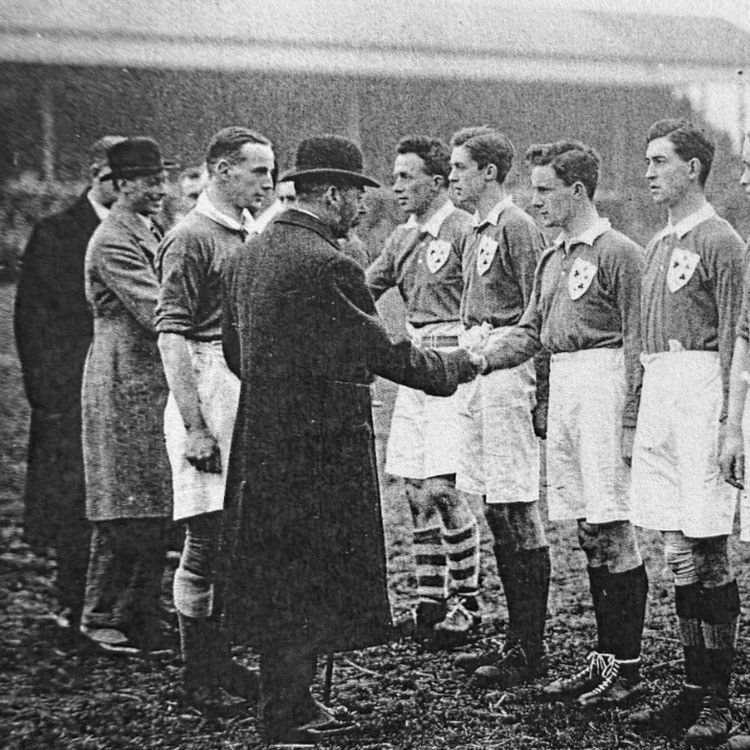 cover art for Studs and Spikes - Denis Cussen - Ireland's Fastest Man Interview with Author Des Ryan