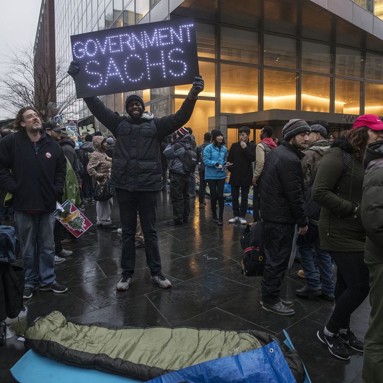 cover art for Protesters camp outside Goldman Sachs HQ