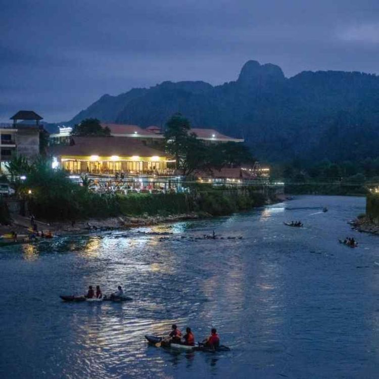 cover art for Inside the Laos party town where backpackers die