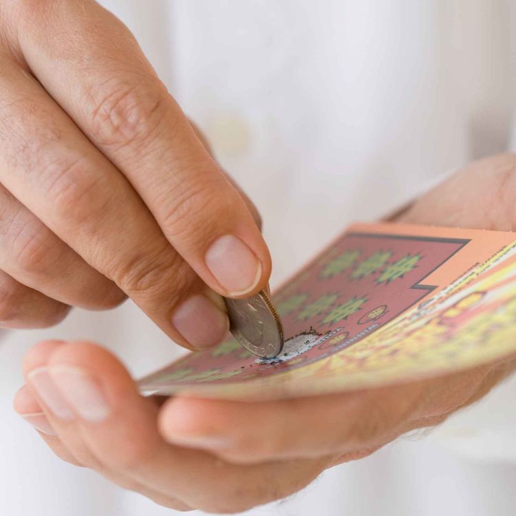 cover art for 4988: LISTEN¦ Would you split £1m lottery jackpot with your ex? A woman from Lincolnshire is refusing to share the cash with her former partner,  as she paid for the scratch card - he says it was his idea to buy it 