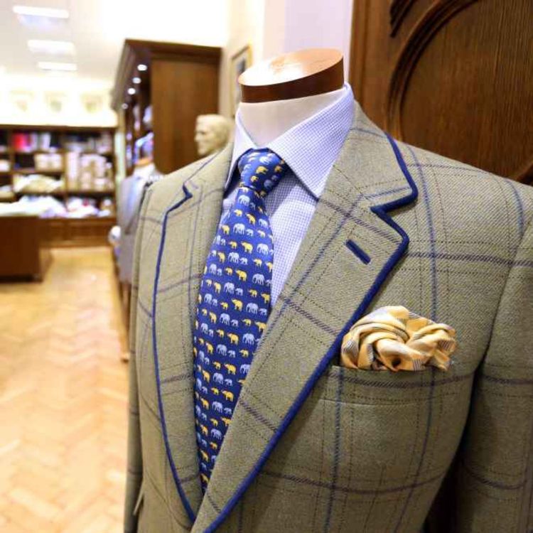 cover art for 5223: LISTEN¦ Suits - stylish or stuffy? Sales have risen in the past year, as more men appear to be turning away from 'dressing down'. We spoke to top tailor Chris Suitor