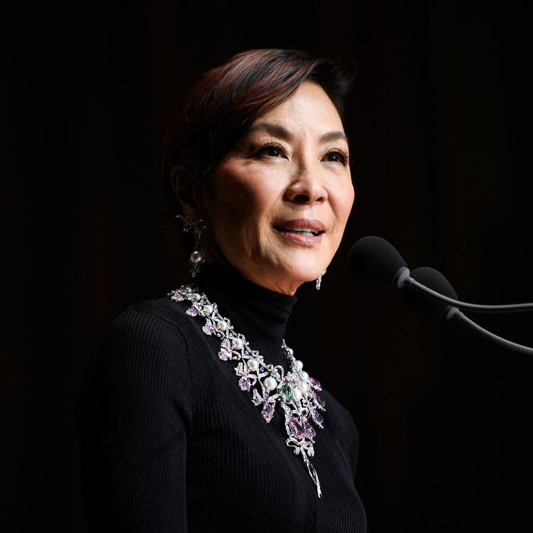 cover art for How Michelle Yeoh Conquered Hollywood — and Fashion 