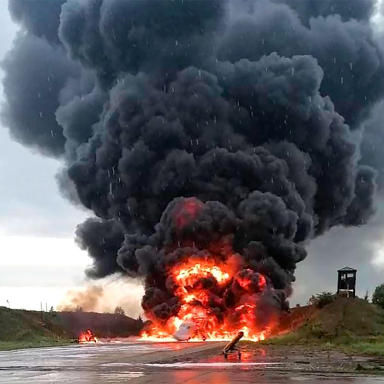 cover art for Gun battles reported in Russia as Ukrainian saboteurs wreak havoc & Russian warplane factory 'ablaze'