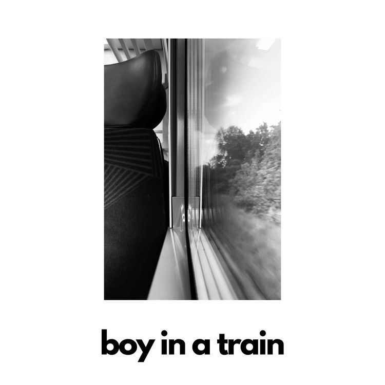 cover art for E13 - boy in a train