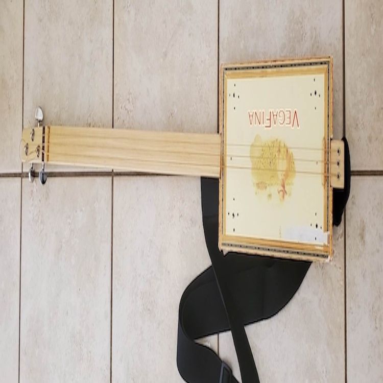 cover art for Demonstrating a cigar box guitar