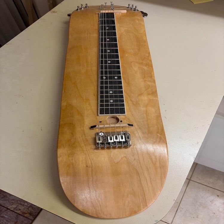 cover art for Acoustic skateboard lap guitar demo