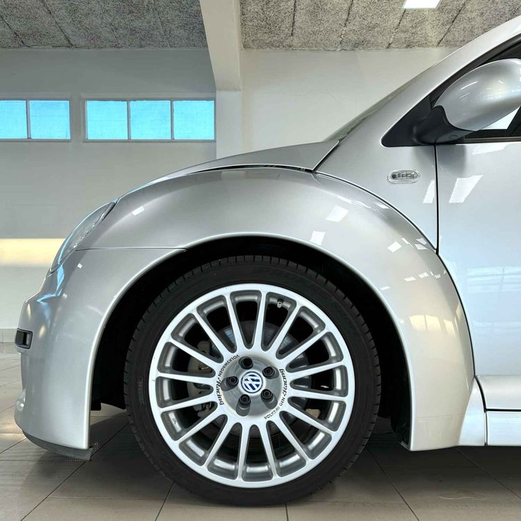 cover art for 10 siste: Grisebillig AMG, spinnvill New Beetle (faktisk!) dobbel Escort Xr3i, og sonen til Alfi har ny bil