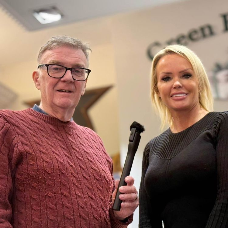 cover art for A cobbled street thriving in the city