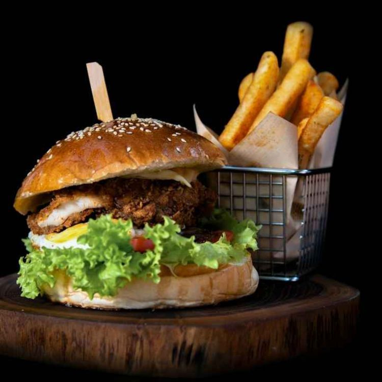 cover art for The burger has become a luxury item / Singles want commitment more than ever — they just can't figure out how to get there / The dictionary just added looksmaxxing and cuffing season